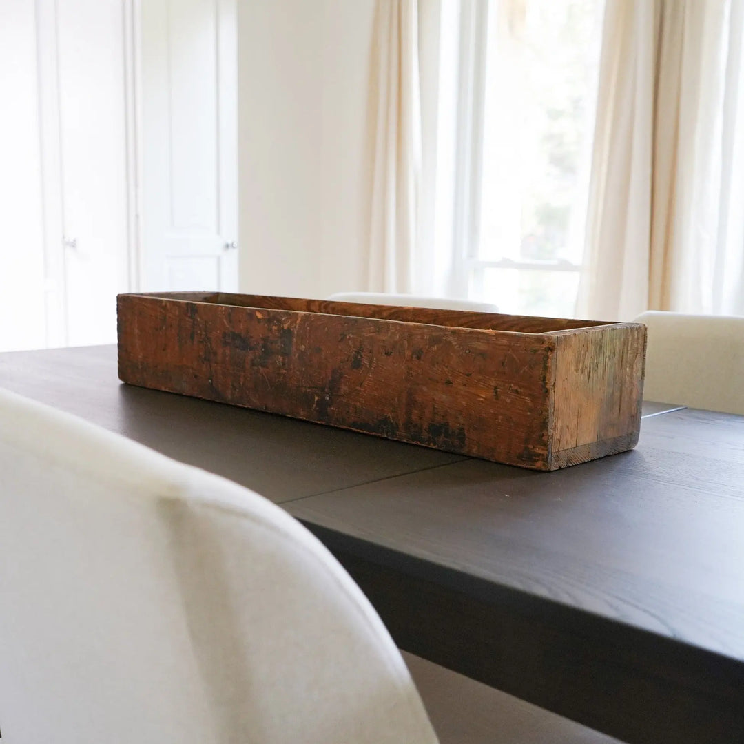 large vintage wood planter box on dining table